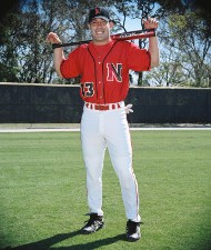 Baseball Player Holding Bat